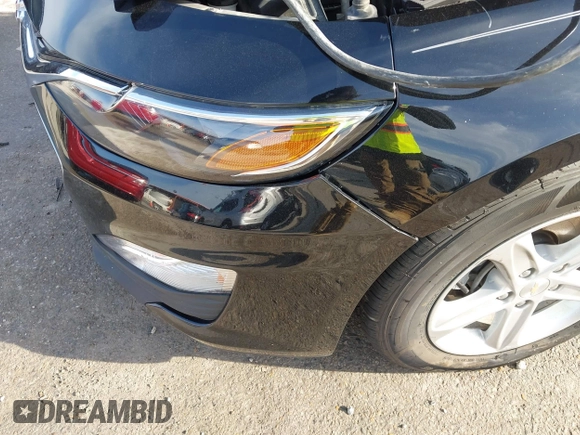 2019 Chevrolet Malibu LS with VIN 1G1ZB5ST0KF215845, listed as a IAAI auction lot 41769675 with 81,912 mi miles and . Bid and sale history available at DreamBid. Image 18.
