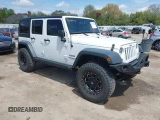 2016 Jeep Wrangler Unlimited Sport z VIN 1C4HJWDG5GL308803, wystawiony jako IAAI lot #42181473 z przebiegiem 41 621 mil mil oraz . Historia ofert i sprzedaży dostępna na DreamBid. Obrazek 1.