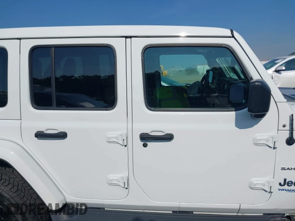 2021 Jeep Wrangler Unlimited Sahara z VIN 1C4JJXP6XMW840844, wystawiony jako IAAI lot #42152271 z przebiegiem 68 209 mil mil oraz . Historia ofert i sprzedaży dostępna na DreamBid. Obrazek 13.