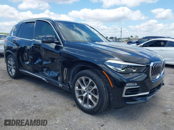 2019 BMW X5 xDrive40i with VIN 5UXCR6C59KLL23735, listed as a IAAI auction lot 41999791 with 31,072 mi miles. Bid and sale history available at carsss.com. Image 1.