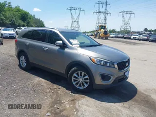 2016 Kia Sorento LX z VIN 5XYPGDA52GG044582, wystawiony jako IAAI lot #42402596 z przebiegiem 143 250 mil mil oraz . Historia ofert i sprzedaży dostępna na DreamBid. Obrazek 1.