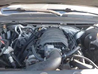 2015 Chevrolet Tahoe LT with VIN 1GNSCBKC5FR156050, listed as a IAAI auction lot 41486815 with 220,599 mi miles and . Bid and sale history available at DreamBid. Image 10.