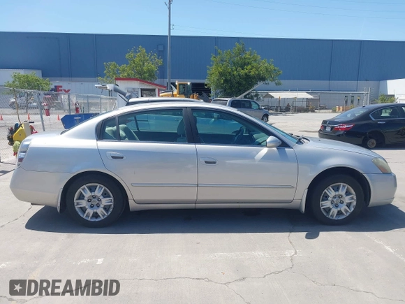 2006 Nissan Altima S with VIN 1N4AL11D56N405498, listed as a IAAI auction lot 42082567 with 228,463 mi miles and . Bid and sale history available at DreamBid. Image 13.