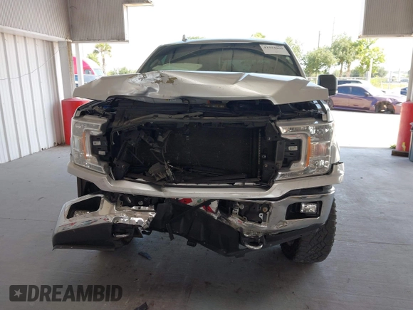 2018 Ford F-150 XL with VIN 1FTEW1EG2JFB52134, listed as a IAAI auction lot 42334009 with 130,315 mi miles and . Bid and sale history available at DreamBid. Image 13.