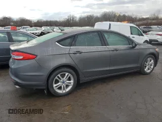 2018 Ford Fusion SE with VIN 3FA6P0H74JR170974, listed as a Copart auction lot 47134295 with 148,023 mi miles and Salvage Title. Bid and sale history available at DreamBid. Image 3.