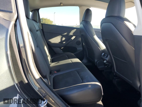2024 Tesla Model Y with VIN 7SAYGDED4RF017614, listed as a Copart auction lot 88494625 with 11,209 mi miles and Salvage title. Bid and sale history available at DreamBid. Image 11.