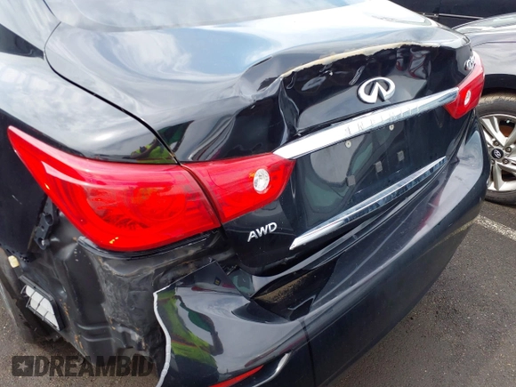 2015 Infiniti Q50 z VIN JN1BV7AR6FM412573, wystawiony jako IAAI lot #41796802 z przebiegiem 136 410 mil mil oraz . Historia ofert i sprzedaży dostępna na DreamBid. Obrazek 18.