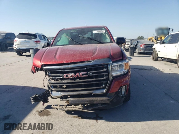 2021 GMC Canyon 4WD AT4 w/Cloth with VIN 1GTG6FEN2M1224875, listed as a Copart auction lot 77651494 with 81,495 mi miles and Salvage Title. Bid and sale history available at carsss.com. Image 5.