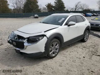 2022 Mazda CX-30 2.5 S Carbon Edition with VIN 3MVDMBCL9NM404733, listed as a Copart auction lot 48546265 with 39,436 mi miles and Salvage Title. Bid and sale history available at carsss.com. Image 1.