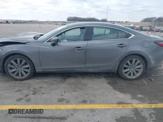 2020 Mazda 6 Grand Touring with VIN JM1GL1TY6L1525169, listed as a IAAI auction lot 41683512 with 73,313 mi miles and . Bid and sale history available at DreamBid. Image 14.