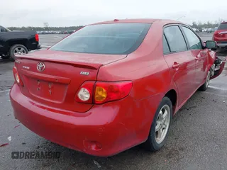 2009 Toyota Corolla with VIN 1NXBU40E09Z099663, listed as a IAAI auction lot 41069276 with 187,726 mi miles. Bid and sale history available at carsss.com. Image 4.