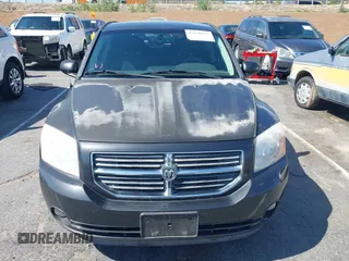 2011 Dodge Caliber Mainstreet with VIN 1B3CB3HA9BD120950, listed as a IAAI auction lot 42150354 with 103,015 mi miles. Bid and sale history available at carsss.com. Image 6.