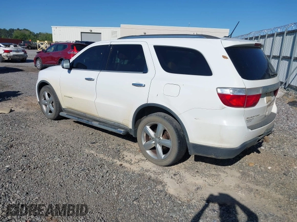 2013 Dodge Durango Citadel with VIN 1C4SDHET0DC571961, listed as a IAAI auction lot 42050261 with 257,637 mi miles and . Bid and sale history available at DreamBid. Image 3.