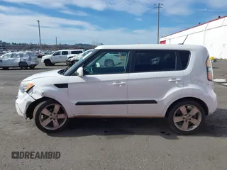 2011 Kia Soul + with VIN KNDJT2A23B7267442, listed as a IAAI auction lot 41671119 with 123,577 mi miles. Bid and sale history available at carsss.com. Image 14.