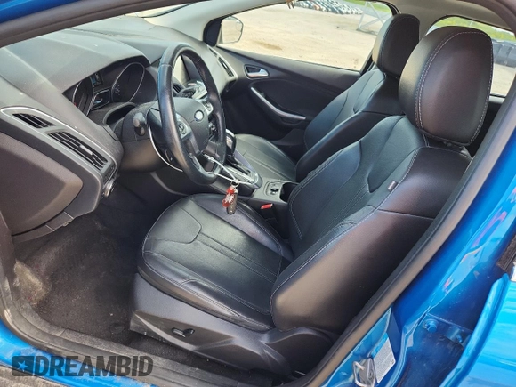 2014 Ford Focus Titanium with VIN 1FADP3N21EL198009, listed as a Copart auction lot 61939335 with 133,792 mi miles and Clean title. Bid and sale history available at DreamBid. Image 7.
