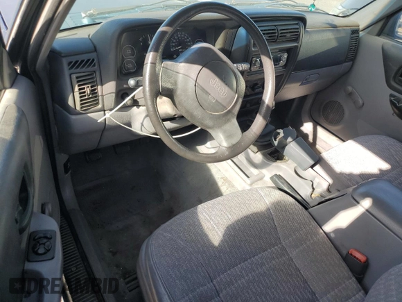 1997 Jeep Cherokee SE with VIN 1J4FT28S3VL523807, listed as a Copart auction lot 46674525 with 144,635 mi miles and Clean title. Bid and sale history available at DreamBid. Image 8.
