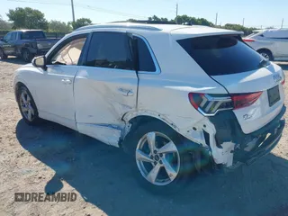 2021 Audi Q3 Premium with VIN WA1AUCF32M1097059, listed as a IAAI auction lot 41825132 with 66,144 mi miles and . Bid and sale history available at DreamBid. Image 3.