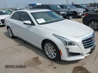 2015 Cadillac CTS Luxury RWD with VIN 1G6AR5SX9F0141260, listed as a IAAI auction lot 41943964 with 135,557 mi miles and . Bid and sale history available at DreamBid. Image 1.