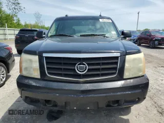 2004 Cadillac Escalade z VIN 1GYEK63N54R256740, wystawiony jako Copart lot #58633795 z przebiegiem 245 335 mil mil oraz Czysty tytuł • Clean title. Historia ofert i sprzedaży dostępna na DreamBid. Obrazek 5.