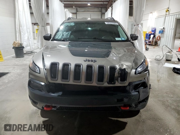 2017 Jeep Cherokee Trailhawk L Plus z VIN 1C4PJMBB4HW593615, wystawiony jako Copart lot #56342885 z przebiegiem 88 215 mil mil oraz Szkoda całkowita • Salvage title. Historia ofert i sprzedaży dostępna na DreamBid. Obrazek 5.