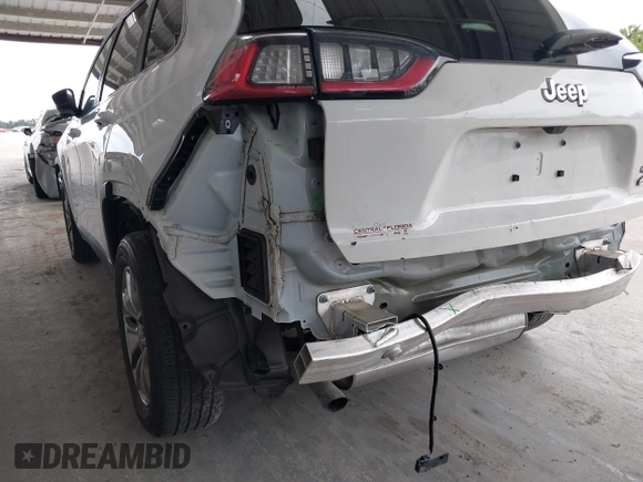 2022 Jeep Cherokee Latitude Lux z VIN 1C4PJLMXXND501689, wystawiony jako IAAI lot #42401720 z przebiegiem 34 037 mil mil oraz . Historia ofert i sprzedaży dostępna na DreamBid. Obrazek 6.