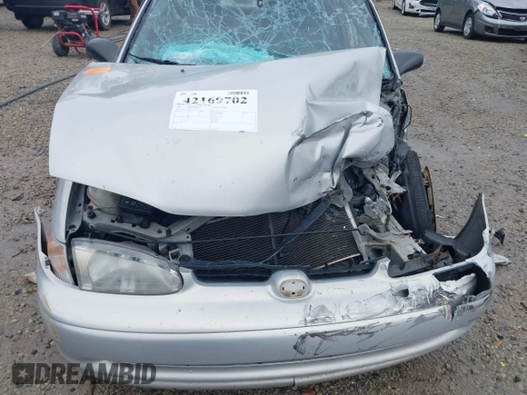 2001 Chevrolet Prizm z VIN 1Y1SK52851Z423703, wystawiony jako IAAI lot #42169702 z przebiegiem Nie podano mil oraz . Historia ofert i sprzedaży dostępna na DreamBid. Obrazek 18.
