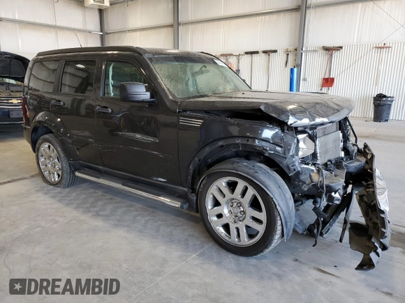 2010 Dodge Nitro SE z VIN 1D4PU2GK9AW141981, wystawiony jako Copart lot #53954265 z przebiegiem 109 669 mil mil oraz Szkoda całkowita • Salvage title. Historia ofert i sprzedaży dostępna na DreamBid. Obrazek 4.