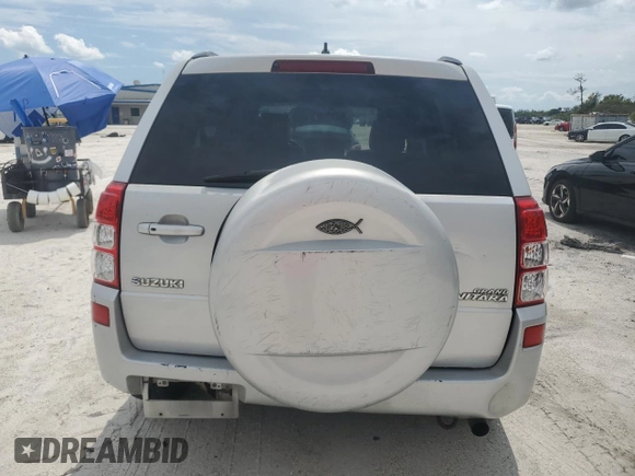 2006 Suzuki Grand Vitara Luxury с VIN JS3TE947264102168, выставлен на аукционе Copart как лот 71726254 с пробегом 276 789 миль миль и Списание • Salvage title. История ставок и продаж доступна на DreamBid. Изображение 6.