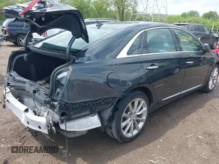 2014 Cadillac XTS Luxury with VIN 2G61M5S31E9308419, listed as a IAAI auction lot 42128868 with 111,492 mi miles and . Bid and sale history available at DreamBid. Image 4.