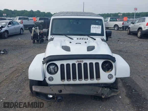 2017 Jeep Wrangler Unlimited Sahara with VIN 1C4HJWEG3HL505307, listed as a IAAI auction lot 42497015 with 92,790 mi miles and . Bid and sale history available at DreamBid. Image 12.
