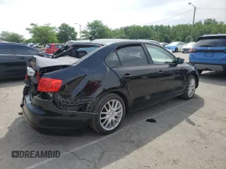 2012 Volkswagen Jetta SE with VIN 3VWDP7AJ2CM306614, listed as a Copart auction lot 58699615 with 164,234 mi miles and Salvage title. Bid and sale history available at DreamBid. Image 3.