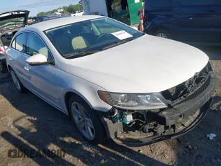 2014 Volkswagen CC R-Line with VIN WVWBP7AN0EE504680, listed as a IAAI auction lot 41990269 with 137,660 mi miles. Bid and sale history available at carsss.com. Image 1.