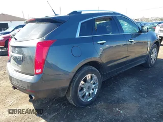2011 Cadillac SRX Luxury Collection with VIN 3GYFNDEYXBS556758, listed as a IAAI auction lot 42054672 with 151,648 mi miles. Bid and sale history available at carsss.com. Image 4.