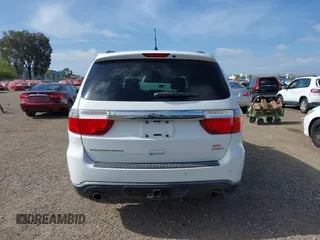 2013 Dodge Durango Crew with VIN 1C4SDHDT2DC679600, listed as a IAAI auction lot 42215737 with 128,499 mi miles and . Bid and sale history available at DreamBid. Image 16.