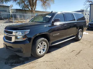 2019 Chevrolet Suburban LS z VIN 1GNSCGKC6KR180042, wystawiony jako Copart lot #76829394 z przebiegiem 75 574 mil mil oraz Szkoda całkowita • Salvage title. Historia ofert i sprzedaży dostępna na DreamBid. Obrazek 1.