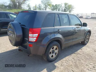 2012 Suzuki Grand Vitara Premium z VIN JS3TD0D22C4101455, wystawiony jako IAAI lot #42211776 z przebiegiem 153 569 mil mil oraz . Historia ofert i sprzedaży dostępna na DreamBid. Obrazek 4.