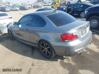 2009 BMW 1 Series 135i with VIN WBAUC73549VK80091, listed as a IAAI auction lot 41228611 with 128,515 mi miles. Bid and sale history available at carsss.com. Image 3.