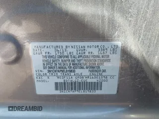2014 Nissan Versa SV with VIN 3N1CN7AP9EL819833, listed as a IAAI auction lot 41351616 with 109,956 mi miles. Bid and sale history available at carsss.com. Image 9.