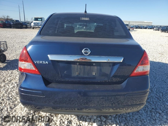 2009 Nissan Versa 1.8 S with VIN 3N1BC11EX9L392360, listed as a Copart auction lot 86980964 with 0 mi miles and Salvage Title. Bid and sale history available at carsss.com. Image 6.