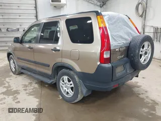 2004 Honda CR-V EX with VIN JHLRD78814C057877, listed as a IAAI auction lot 42065687 with 220,207 mi miles and . Bid and sale history available at carsss.com. Image 3.