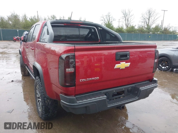 2018 Chevrolet Colorado 4WD ZR2 with VIN 1GCPTEE16J1138755, listed as a IAAI auction lot 41215626 with 118,661 mi miles. Bid and sale history available at carsss.com. Image 3.