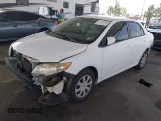 2011 Toyota Corolla L with VIN JTDBU4EE9B9131113, listed as a IAAI auction lot 42028423 with 191,157 mi miles. Bid and sale history available at carsss.com. Image 18.