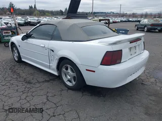 2004 Ford Mustang Deluxe with VIN 1FAFP446X4F134860, listed as a IAAI auction lot 41755643 with 174,410 mi miles. Bid and sale history available at carsss.com. Image 3.