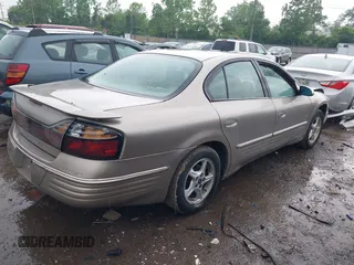 2001 Pontiac Bonneville SE z VIN 1G2HX54K814258899, wystawiony jako IAAI lot #42260783 z przebiegiem 165 869 mil mil oraz . Historia ofert i sprzedaży dostępna na DreamBid. Obrazek 4.