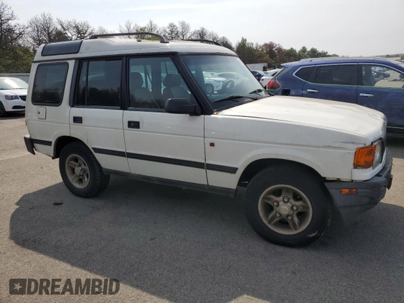 1998 Land Rover Discovery SD z VIN SALJY1246WA781850, wystawiony jako Copart lot #69113644 z przebiegiem 58 468 mil mil oraz Czysty tytuł • Clean title. Historia ofert i sprzedaży dostępna na DreamBid. Obrazek 4.