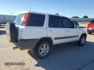 1999 Honda CR-V EX with VIN JHLRD1869XC038784, listed as a Copart auction lot 80773114 with 230,090 mi miles and Clean Title. Bid and sale history available at carsss.com. Image 3.