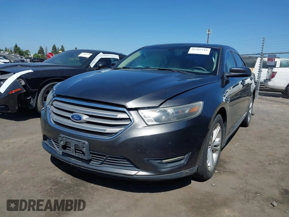 2015 Ford Taurus SEL z VIN 1FAHP2E83FG184588, wystawiony jako IAAI lot #42262166 z przebiegiem 116 392 mil mil oraz . Historia ofert i sprzedaży dostępna na DreamBid. Obrazek 2.