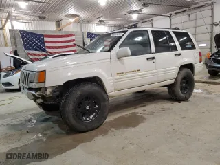 1997 Jeep Grand Cherokee Limited with VIN 1J4GZ78Y5VC747553, listed as a Copart auction lot 49125085 with 0 mi miles and Salvage Title. Bid and sale history available at carsss.com. Image 1.