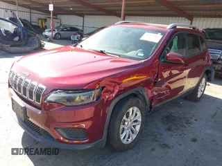 2020 Jeep Cherokee Latitude with VIN 1C4PJLCB4LD648903, listed as a IAAI auction lot 42267209 with 20,133 mi miles and . Bid and sale history available at DreamBid. Image 2.