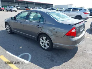 2012 Ford Fusion SE with VIN 3FAHP0HA0CR102548, listed as a IAAI auction lot 42628344 with 166,597 mi miles and . Bid and sale history available at DreamBid. Image 3.